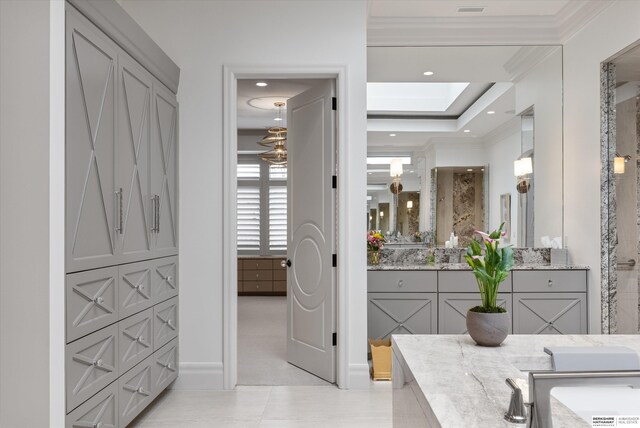 bathroom featuring recessed lighting, vanity, and ornamental molding