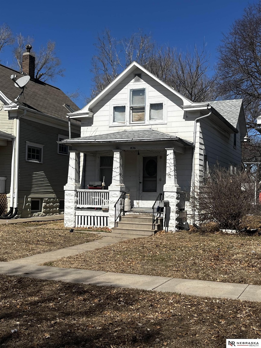 bungalow-style home with covered porch