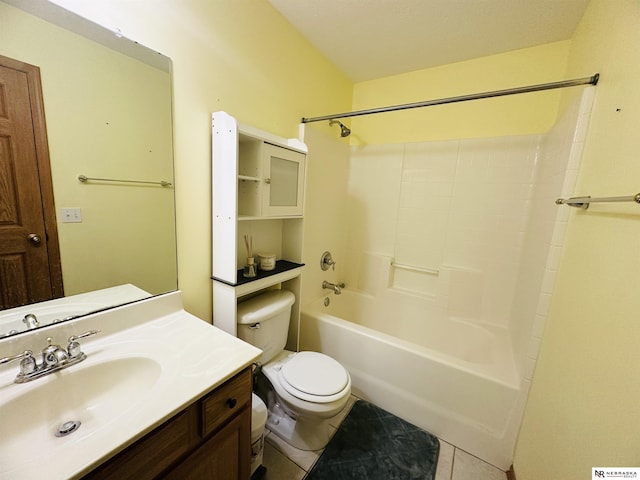 bathroom with tile patterned floors, toilet, tub / shower combination, and vanity