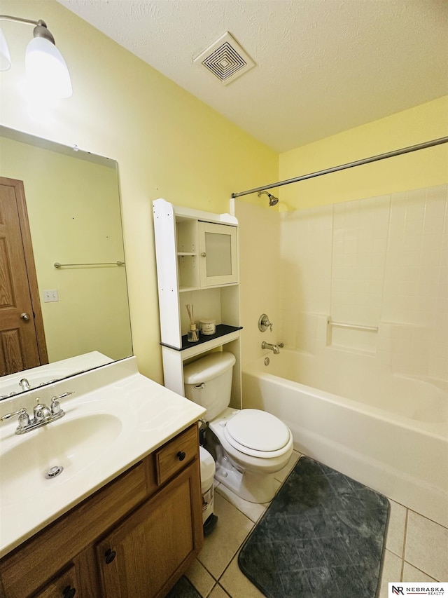 bathroom featuring visible vents, toilet, shower / bath combination, tile patterned floors, and a textured ceiling