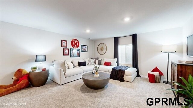 living room featuring recessed lighting and carpet floors