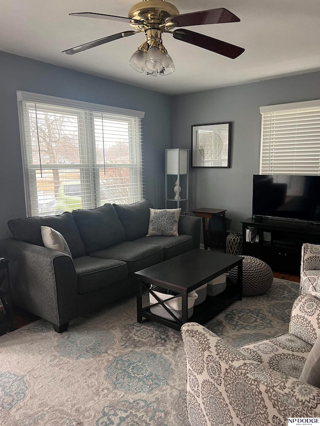 living room with a ceiling fan