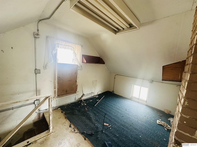 bonus room with a wealth of natural light and lofted ceiling