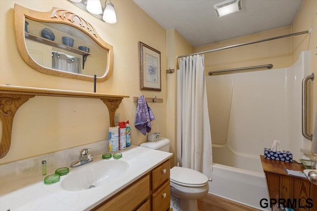 bathroom featuring vanity, shower / tub combo, toilet, and visible vents