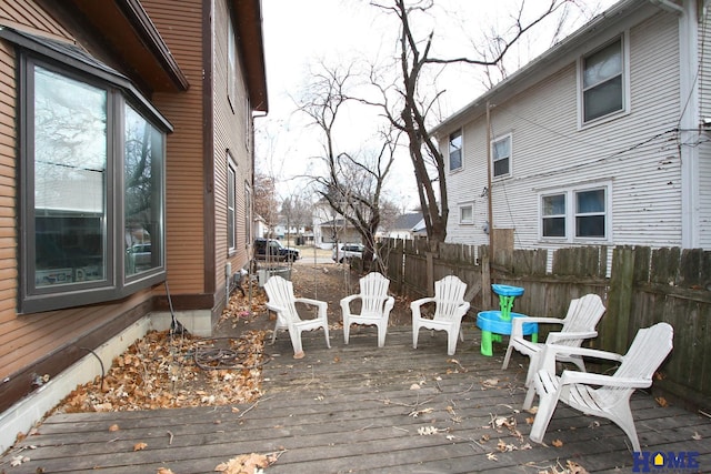 wooden deck featuring fence