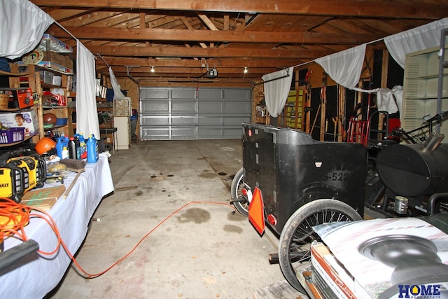 garage featuring a garage door opener