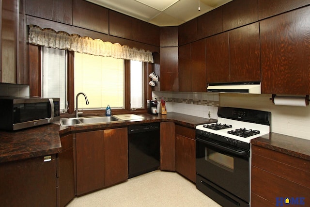 kitchen featuring ventilation hood, gas stove, a sink, black dishwasher, and stainless steel microwave