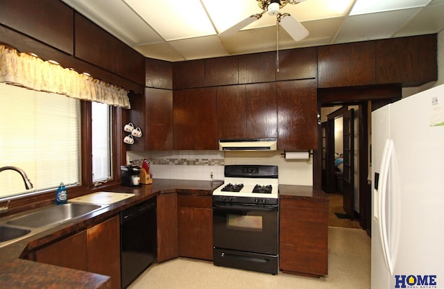 kitchen with ventilation hood, range with gas cooktop, black dishwasher, white refrigerator with ice dispenser, and a sink