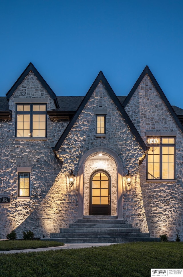 view of french country style house