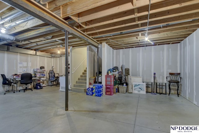 unfinished basement with stairs