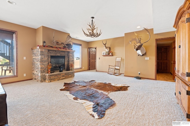 living area with carpet flooring, recessed lighting, a fireplace, and baseboards