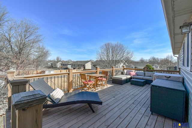 deck featuring a residential view and an outdoor hangout area