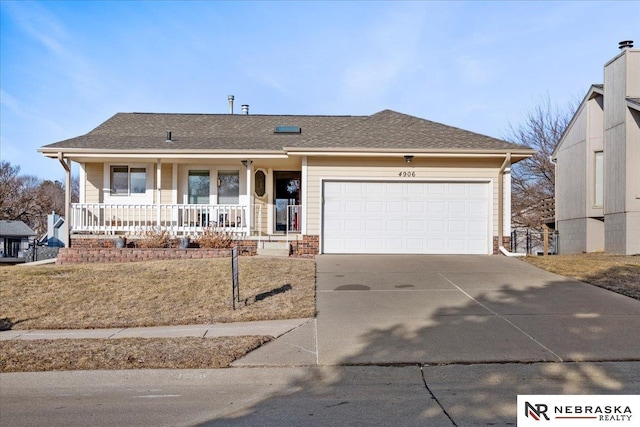 ranch-style house featuring a garage, roof with shingles, covered porch, and driveway