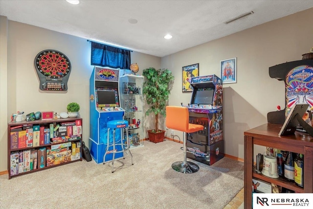 recreation room featuring recessed lighting, visible vents, carpet flooring, and baseboards