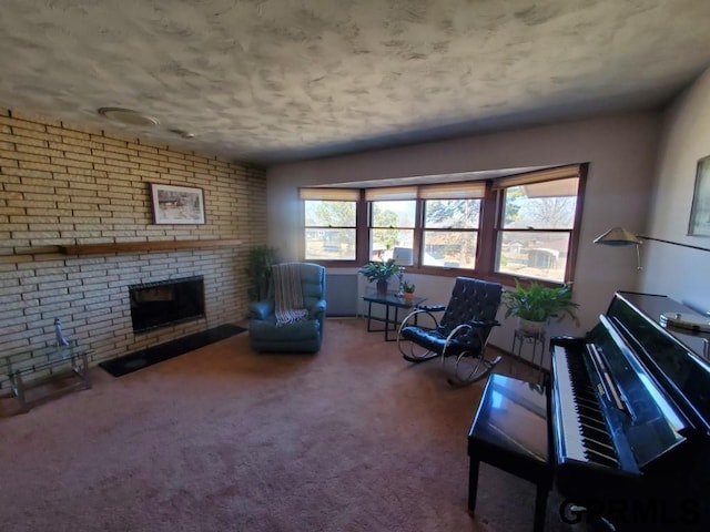 unfurnished room featuring carpet floors, a brick fireplace, and brick wall