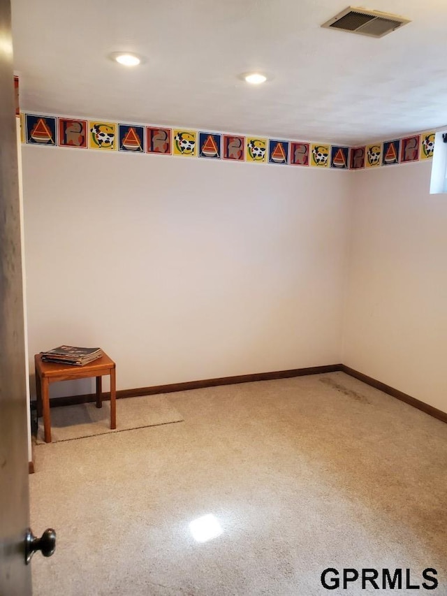 carpeted empty room with recessed lighting, baseboards, and visible vents