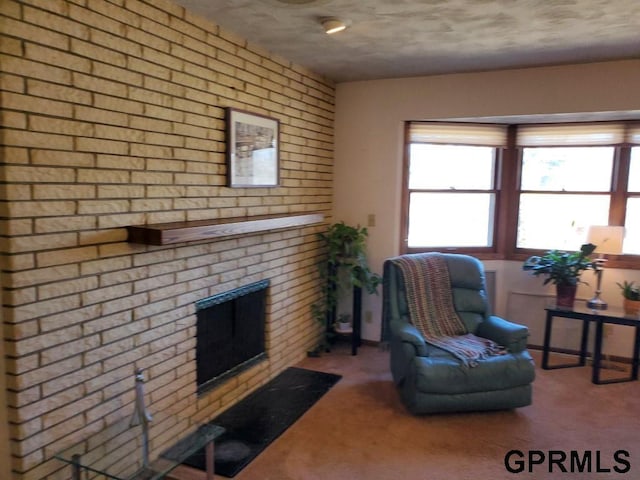 carpeted living room with a fireplace