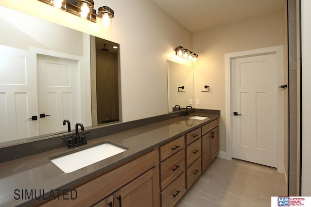 full bathroom featuring a sink and double vanity