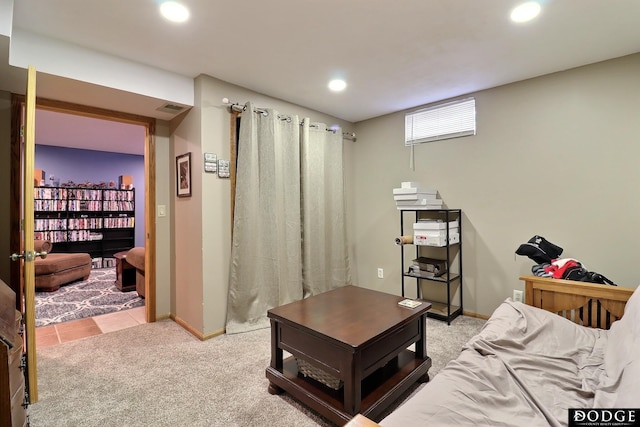 carpeted living room with visible vents, recessed lighting, and baseboards