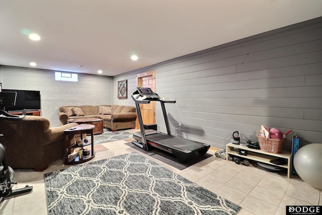 exercise area with recessed lighting and tile patterned flooring