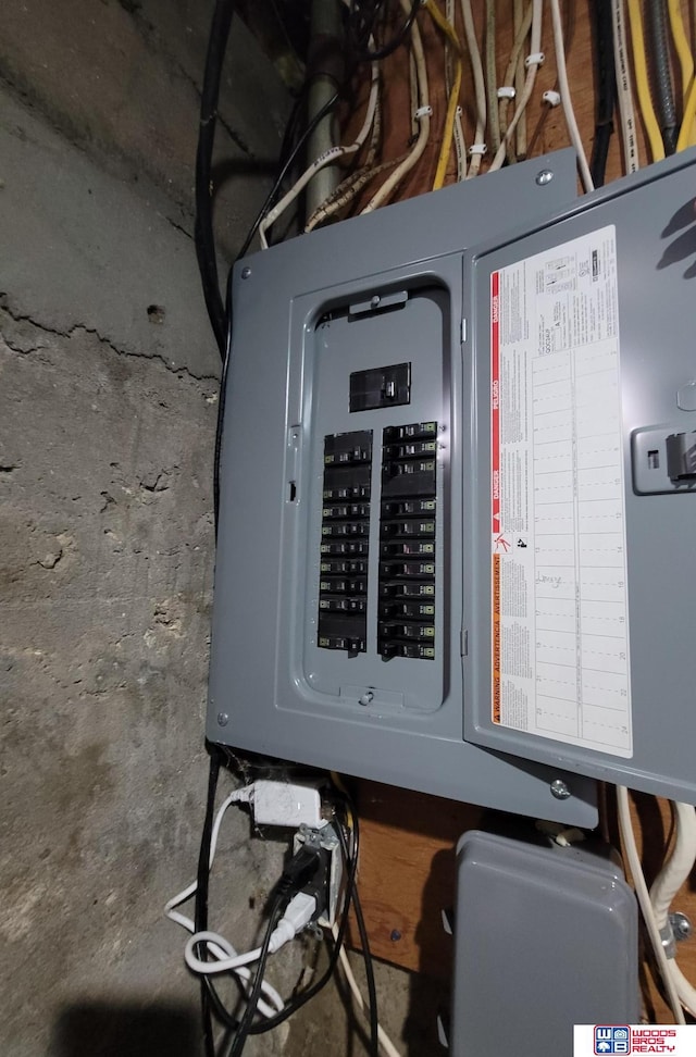 utility room featuring electric panel