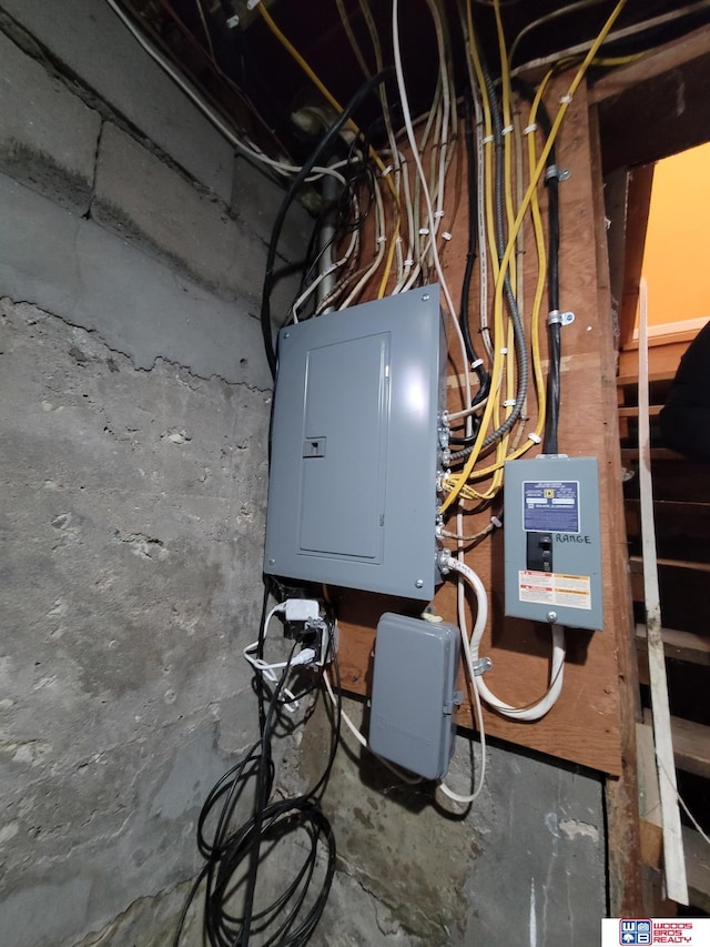 utility room featuring electric panel