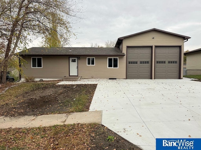 view of front facade featuring driveway and a garage