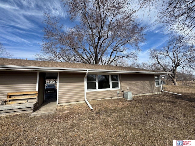 back of property with cooling unit