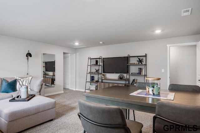 carpeted office space with recessed lighting, visible vents, and baseboards