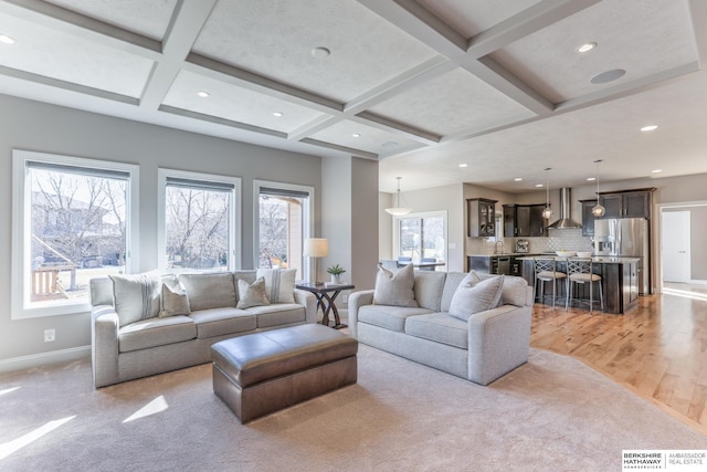 living room featuring visible vents, baseboards, beam ceiling, recessed lighting, and coffered ceiling