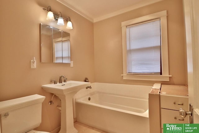 bathroom featuring toilet and a garden tub