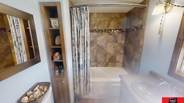 bathroom with shower / bath combination with curtain and vanity