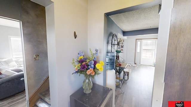 corridor with wood finished floors