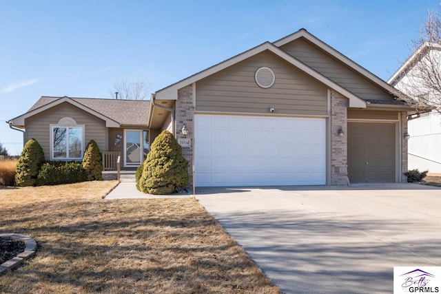 ranch-style home with a garage, brick siding, concrete driveway, and a shingled roof