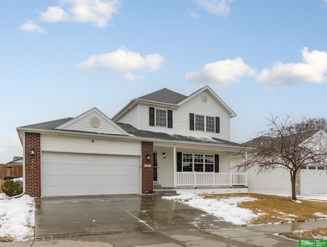 traditional-style home featuring brick siding, concrete driveway, roof with shingles, covered porch, and an attached garage