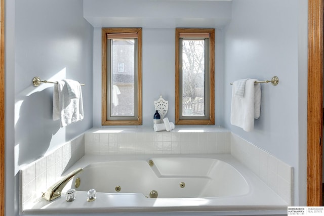 full bath featuring a whirlpool tub