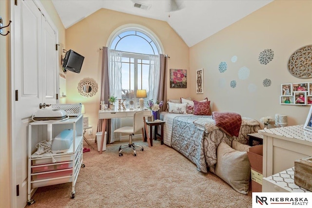 carpeted bedroom featuring visible vents and lofted ceiling