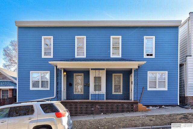 view of front of property featuring covered porch