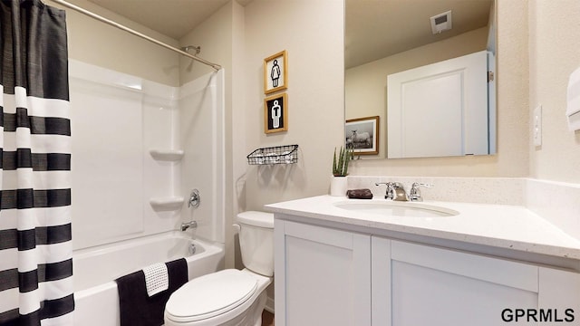 full bath with visible vents, toilet, shower / tub combo with curtain, and vanity