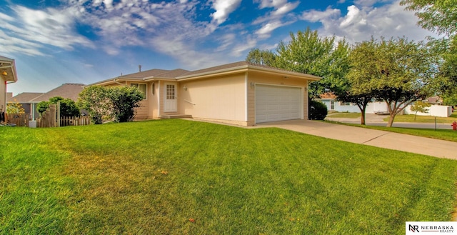 ranch-style home featuring a garage, concrete driveway, a front lawn, and fence