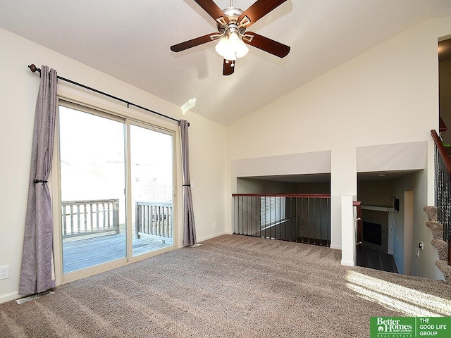 unfurnished living room with visible vents, lofted ceiling, carpet, and a ceiling fan