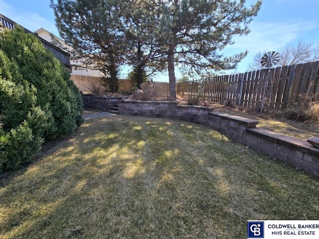 view of yard featuring a fenced backyard