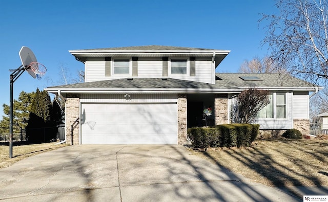 view of front of home with a garage, brick siding, concrete driveway, and a shingled roof