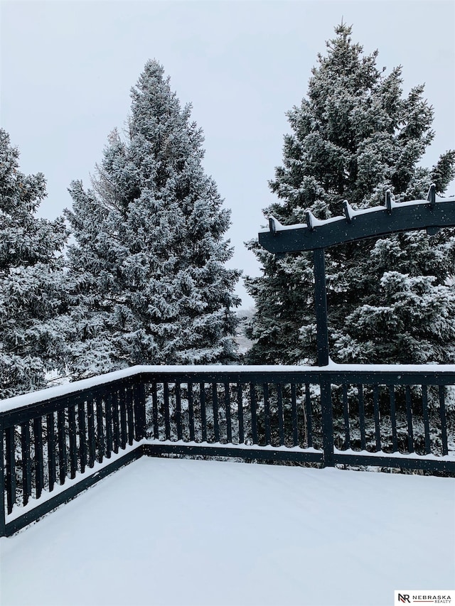 view of snow covered deck