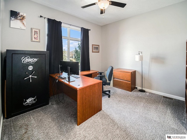 office featuring baseboards, carpet, and ceiling fan