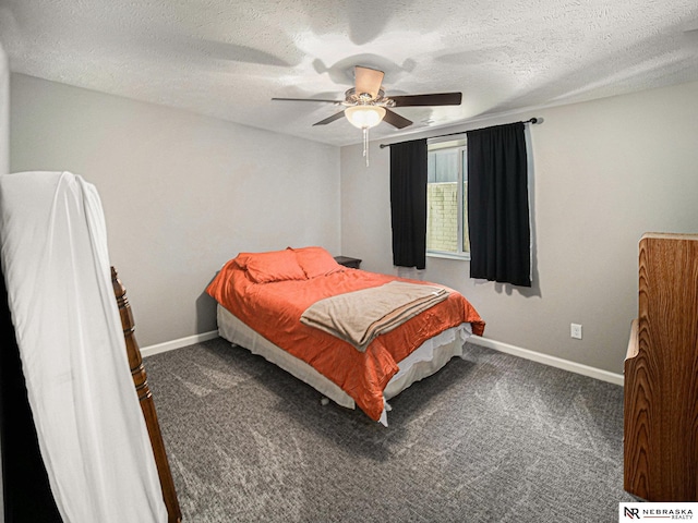 bedroom featuring a ceiling fan, carpet, baseboards, and a textured ceiling