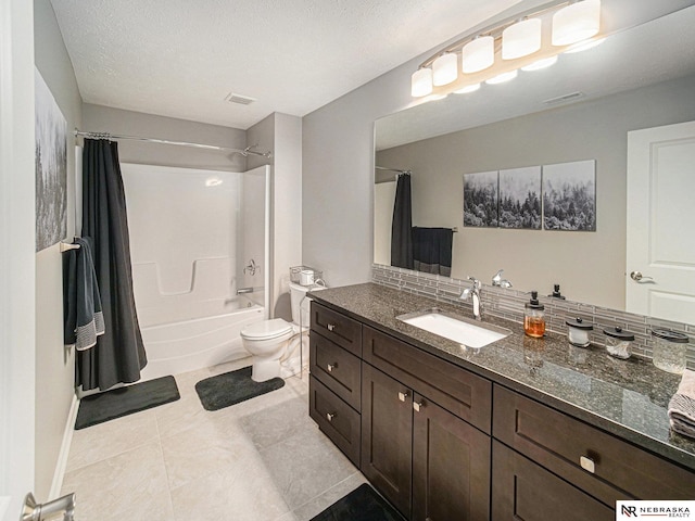 full bathroom featuring visible vents, toilet, shower / bath combo, a textured ceiling, and vanity