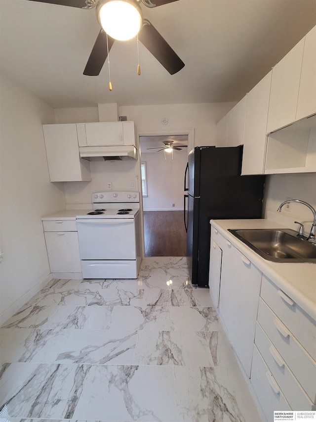 kitchen featuring white electric range oven, a sink, light countertops, white cabinetry, and marble finish floor