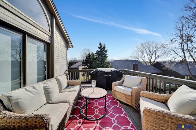 balcony featuring outdoor lounge area and grilling area