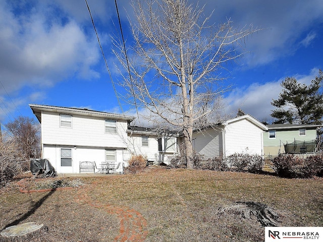 view of front of home with fence